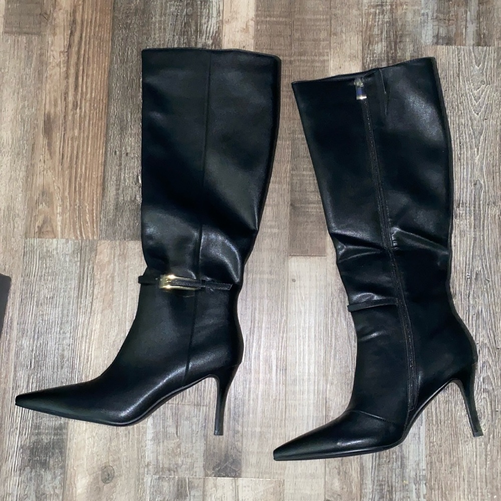 New in box tall black pointed toe heel boots with gold buckle